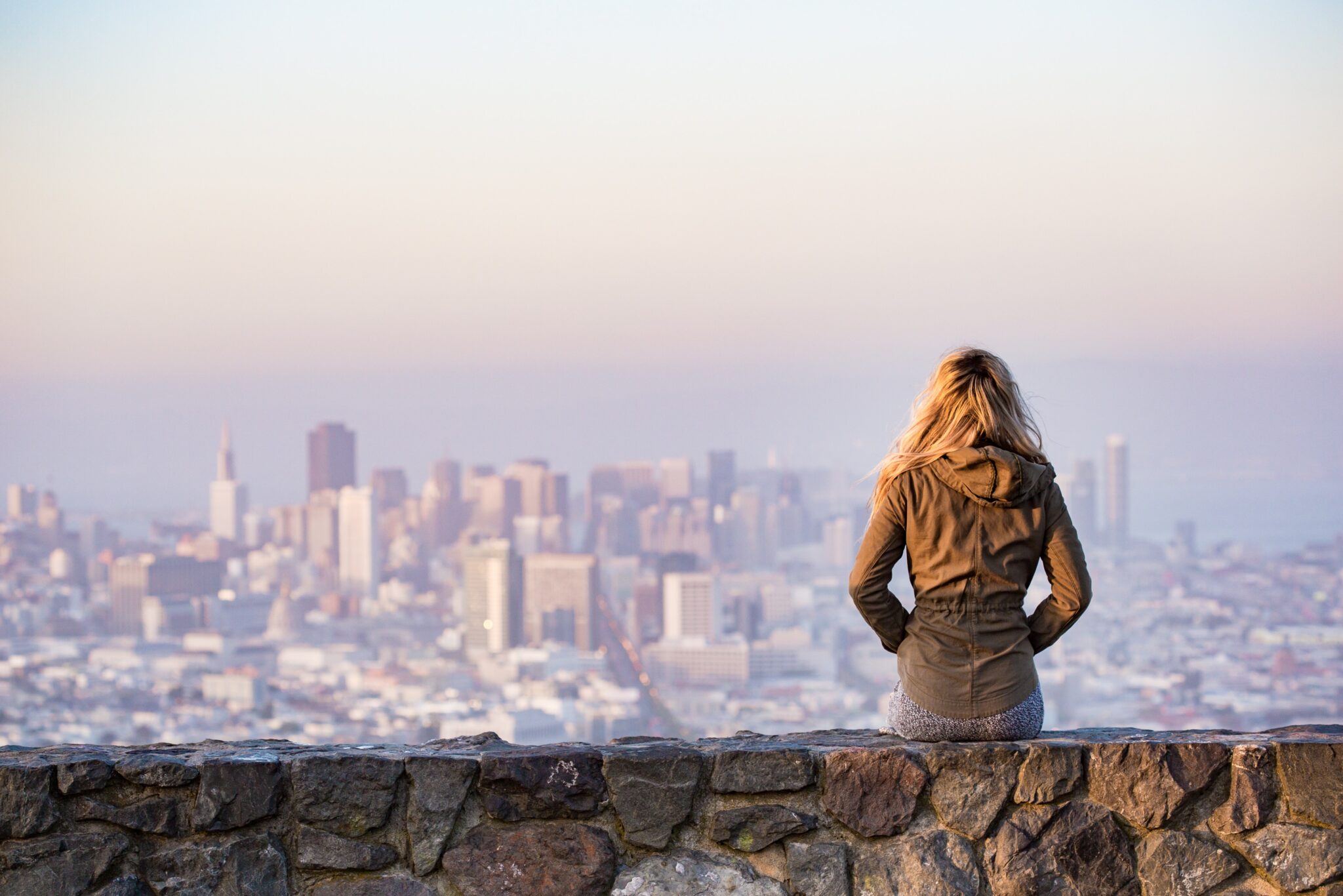 Professional woman overlooking city skyline